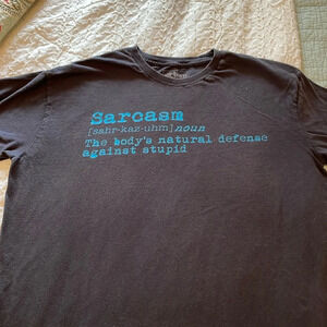 Men’s XL Urban Pipeline black “Sarcasm” short sleeved tshirt. Teal lettering.